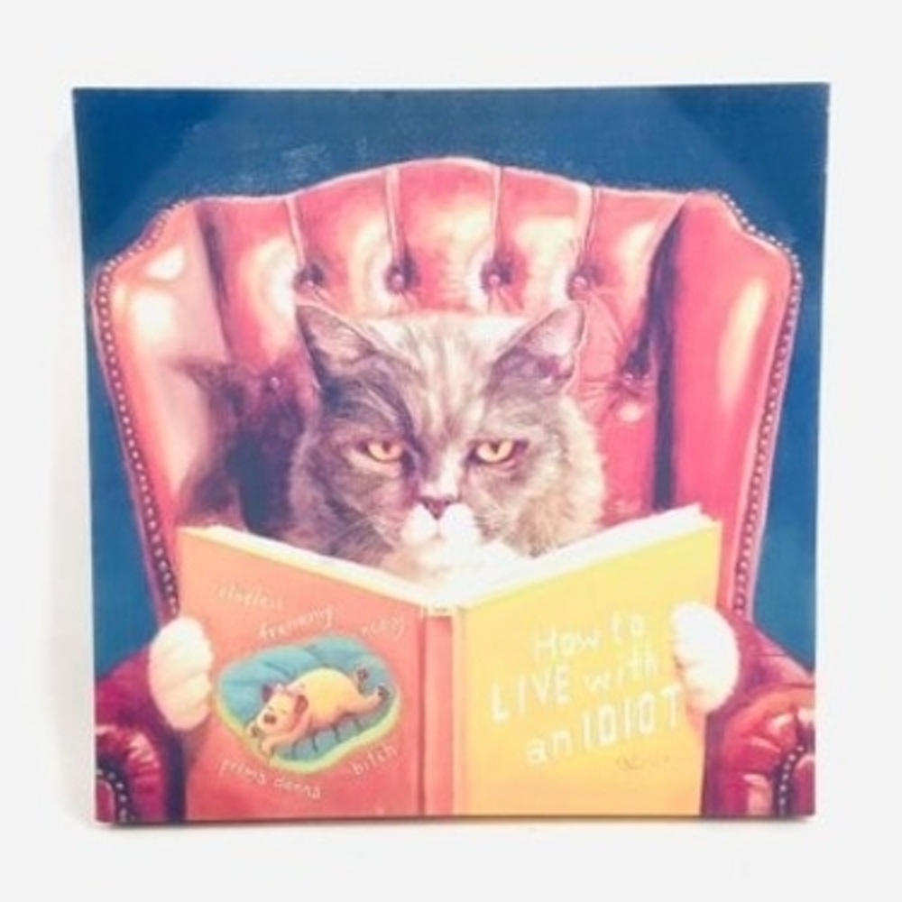 Canvas Print Of Cat Reading "How To Live With An Idiot". 16 X 16"